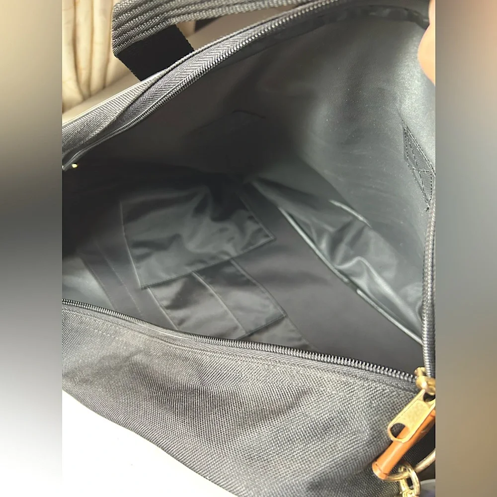 EUC black messenger tote adjustable shoulder strap handles gold hardware